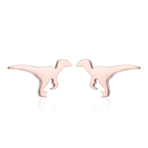 Symmetric front view of rose gold dinosaur stud earrings on white background with reflection