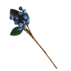 Lifelike blue artificial berry branch with green leaves and frosted texture for home decor