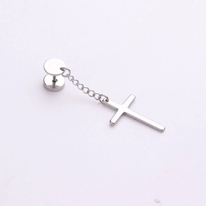 Minimalist stainless steel huggie hoop earring with silver cross pendant on white background