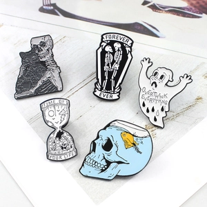 Gothic skull enamel pin set featuring black cat skeleton and hourglass designs