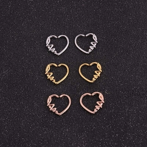 Three-piece heart-shaped piercing stud earrings set in silver, gold, and rose gold finishes
