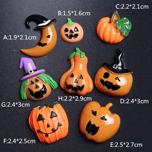 Halloween resin flatback charms featuring pumpkin and wizard moon designs with size markers