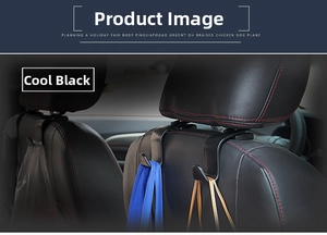 Detail of matte black dual car seat headrest hook holding a heavy shopping bag