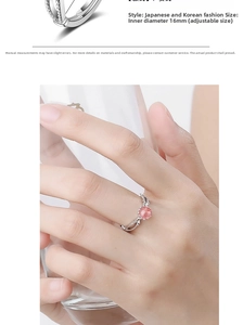 Detail of adjustable silver ring featuring pink strawberry crystal and 16mm inner diameter