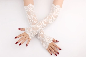 Detailed view of white floral lace sun sleeves with elegant fingerless thumb hole design