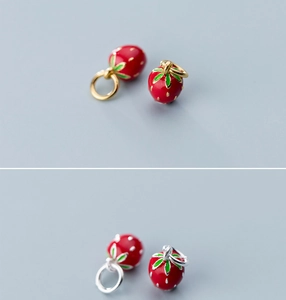 Detailed view of handmade S925 silver strawberry pendant with red enamel finish