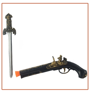 Detail of vintage plastic pirate sword and flintlock toy gun set with gold relief