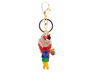 Detail of colorful parrot keychain with enamel finish and sparkling rhinestones