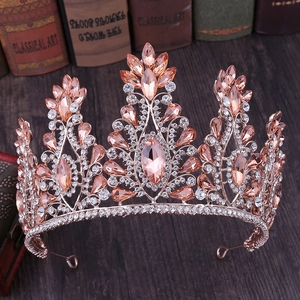 Detailed macro view of champagne crystal droplets on a rose gold bridal crown tiara
