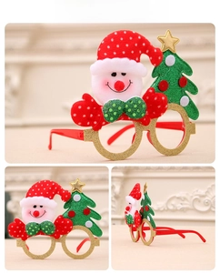 Detail of Christmas snowman glasses frame with golden glitter and festive accents