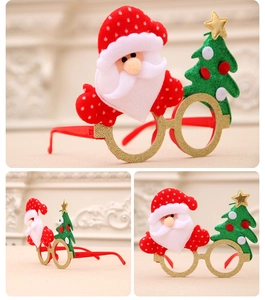 Detailed view of Santa style Christmas glasses with red frames and festive glitter decor