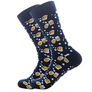 Macro shot of navy blue crew socks with all-over draft beer mug pattern and ribbed cuffs