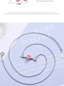Detail view of S925 silver necklace with Cupid arrow and pink strawberry crystal pendant