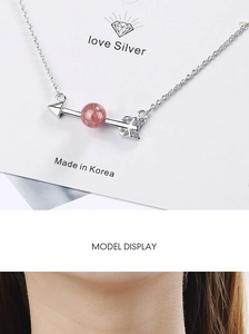 Detail view and model shot of Cupid's arrow necklace with pink moonstone pendant