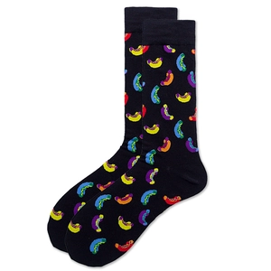 Detail view of black crew socks featuring vibrant abstract hot dog pattern on white background