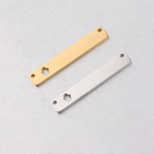 Detail of gold and silver rectangular stainless steel pendants with double holes