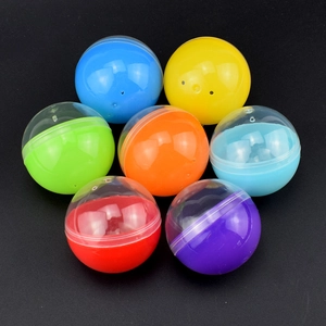 Close-up of colorful 32mm-65mm transparent plastic capsule toy shells in a circular layout