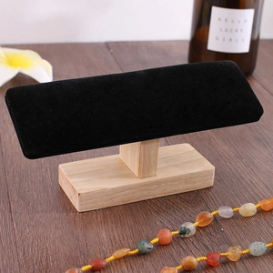 T-bar jewelry display stand with black velvet top and natural solid rubber wood base