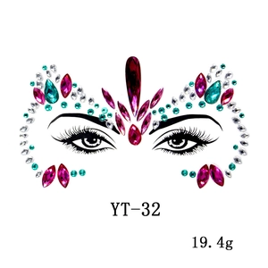 Detail view of colorful resin face gems and crystal jewels for EDM festival makeup