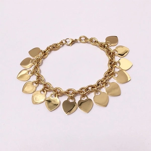Golden titanium steel link bracelet featuring multiple heart shaped pendants and lobster clasp