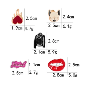 Set of creative enamel pins featuring heart, bulldog, and red lips with size dimensions