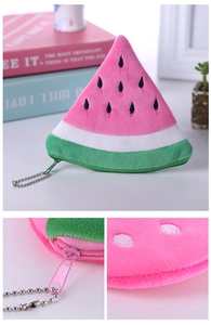 Detail of plush watermelon coin purse with pink zip and silver chain bead attachment