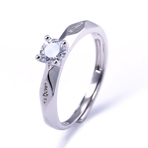Detailed close-up of His Queen engraved silver ring with a sparkling round gemstone