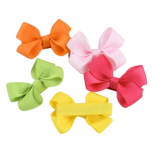 Set of five colorful grosgrain ribbon bow hair clips in orange, pink, green, rose, and yellow