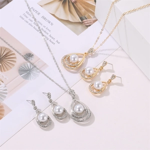 Elegant water-drop pearl jewelry sets with crystal accents in gold and silver