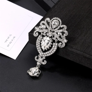 Vintage oversized crystal teardrop brooch with sparkling rhinestones in silver finish