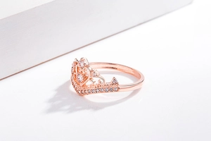 Macro shot of rose gold crown ring with sparkling pave-set cubic zirconia stones