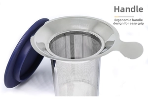 Macro detail of fine mesh 304 stainless steel tea infuser with blue lid and handle