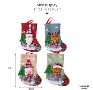 Detail of set of 4 Christmas stockings with 3D cartoon motifs and 23cm height dimensions
