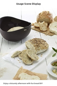 Deep brown silicone steam bowl for bread baking and dough proofing in a kitchen setting
