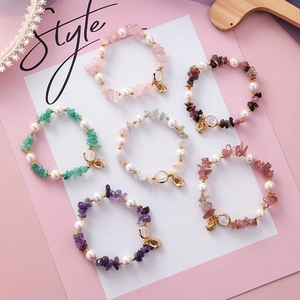 Handmade elastic beach bracelet set with irregular gemstones, shells, and pearls
