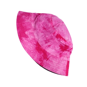 Detailed view of the pink tie-dye bucket hat showing parallel brim stitching and soft texture