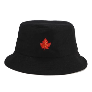 Black canvas bucket hat featuring vibrant maple leaf embroidery with a wide sun-shading brim
