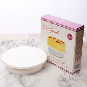 Detailed view of white 28cm plastic cake turntable with 360-degree rotation packaging