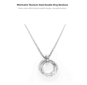 Close-up detail of double ring pendant necklace made of durable titanium steel