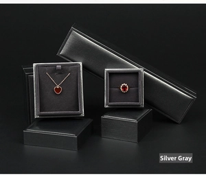 Silver grey jewelry box set for necklace and rings with brushed texture and red lining