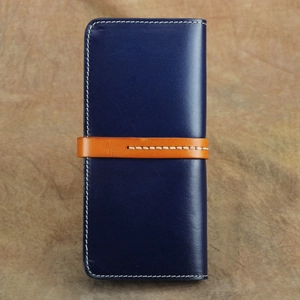 Portafoglio lungo vintage in pelle conciata al vegetale blu con cinturino arancione