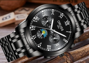 Macro view of men's steel watch dial with Roman numerals and moon phase display