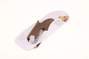 Detail of size M brown silicone duck muzzle for dogs with adjustable grey nylon strap