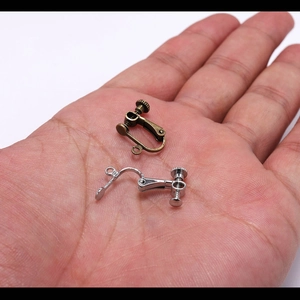 Adjustable copper screw-back ear clip converters in bronze and silver finishes