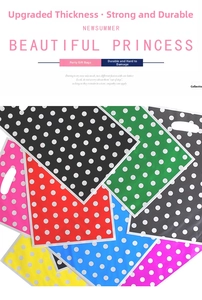 Detailed view of colorful polka dot party gift bags with convenient reinforced handles