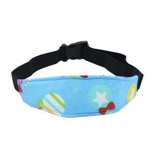 Detail view of the blue sky pattern toddler car seat head support strap with buckle