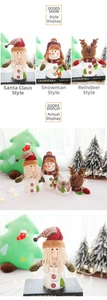 Drei Weihnachts-Süßigkeitengläser mit Weihnachtsmann, Schneemann und Rentier-Plüschfiguren