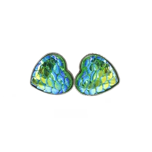Detail of heart-shaped earring settings with green and blue fish scale sequins