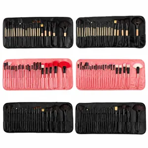 Detalle de un juego de 32 brochas de maquillaje con cerdas sintéticas y estuche enrollable