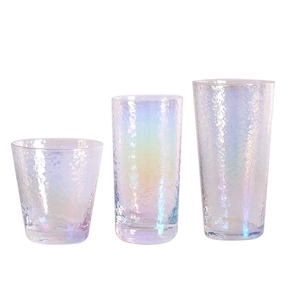 Set of three colorful Japanese style hammered texture rainbow glass cups for juice